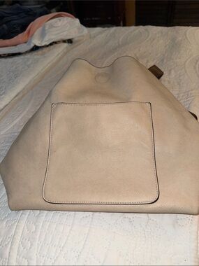 Handbag cream in color bought at  Vionic store